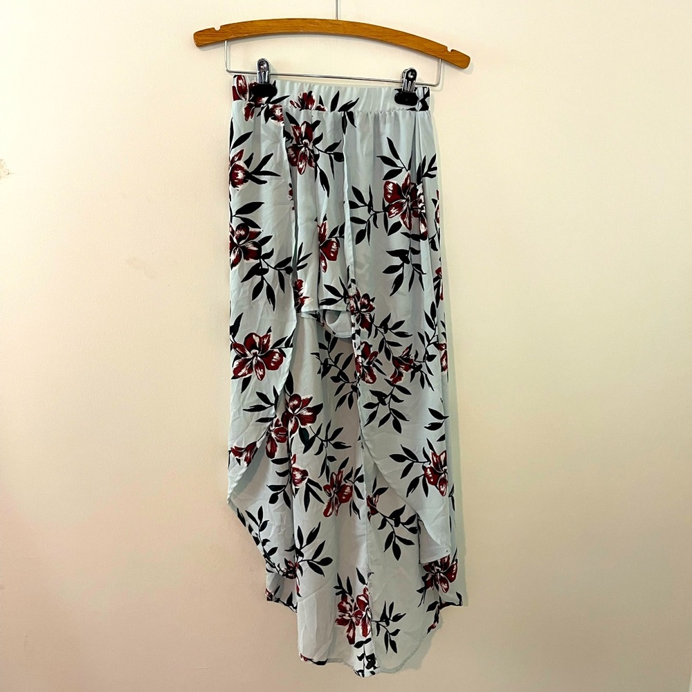 Skort with high-low skirt attached to shorts.